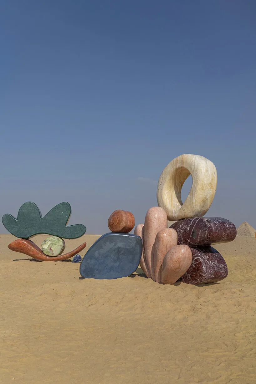 the project embodies Proba’s fluid visual language against the geological and symbolic weight of the pyramids